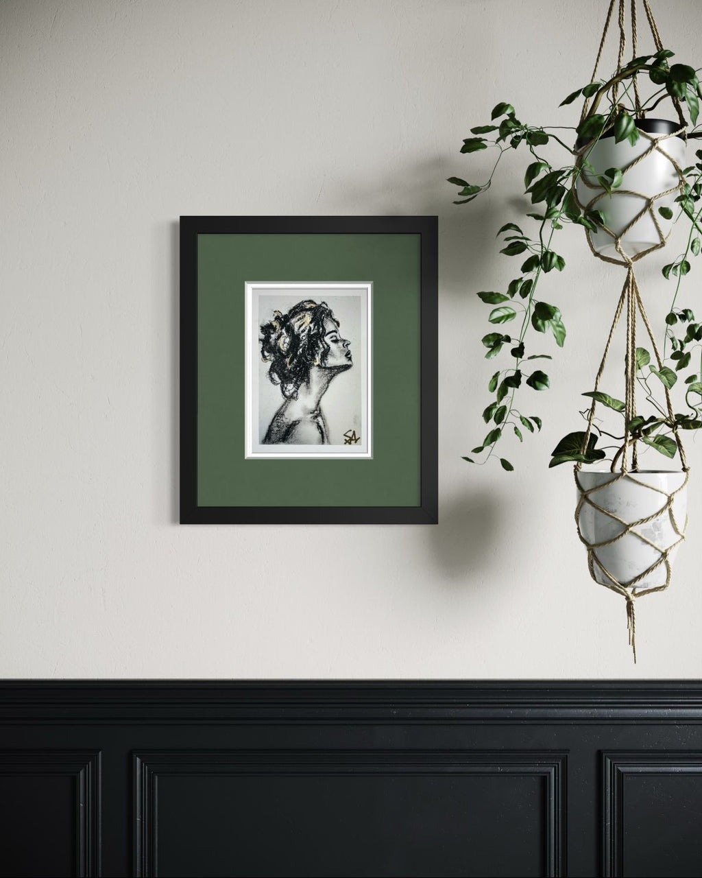Breath of Light 5x7 charcoal art print with gold accents displayed in a black frame with green matting