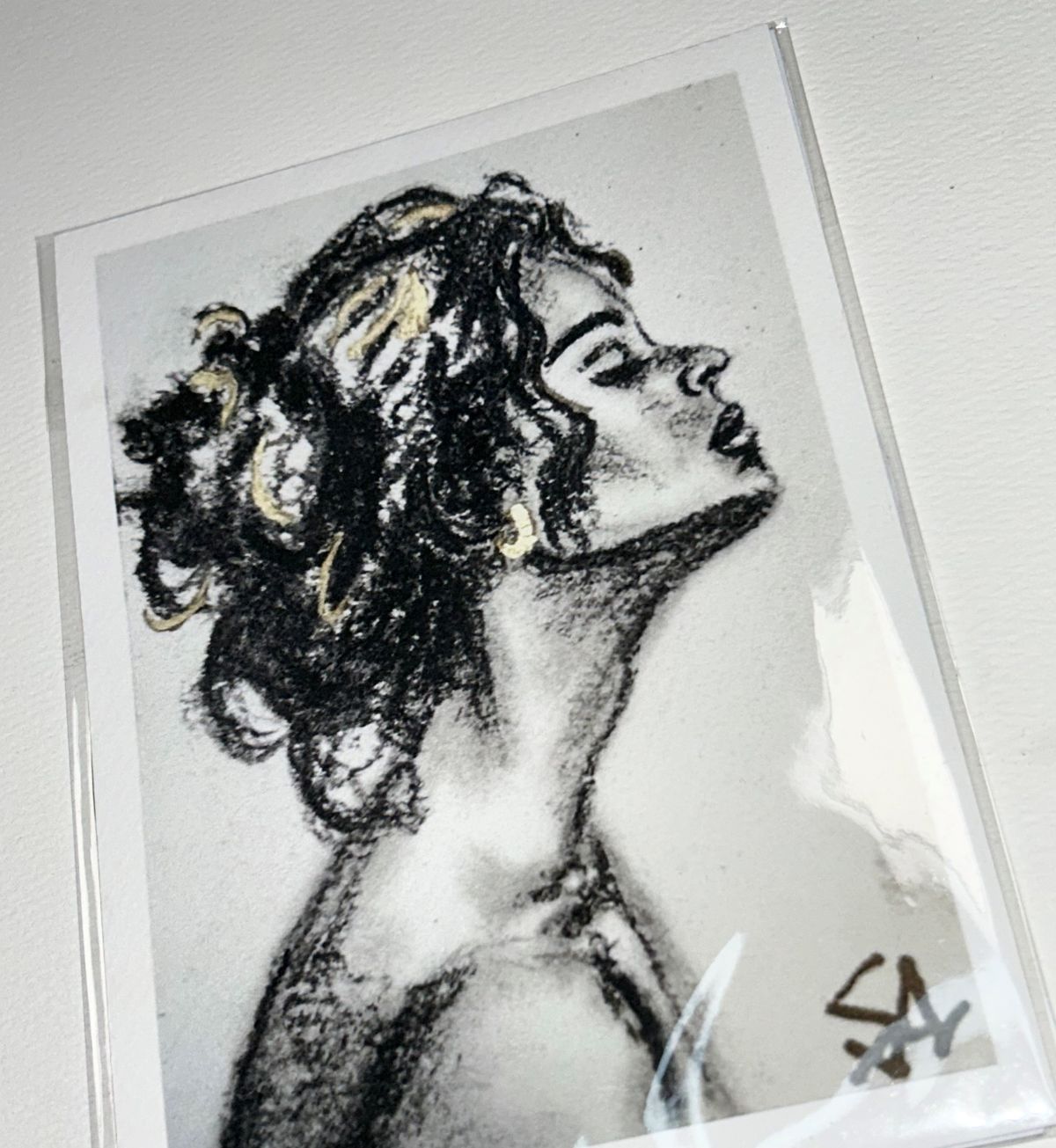 Close-up of Breath of Light 5x7 charcoal portrait print showing expressive texture and subtle gold accents