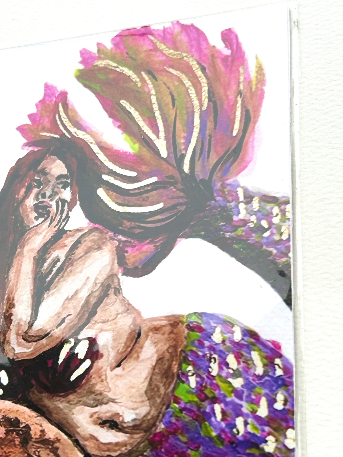 Detail of Calyra Of The Whispering Shores art print showing the mermaid and vibrant pink, gold, and purple tail