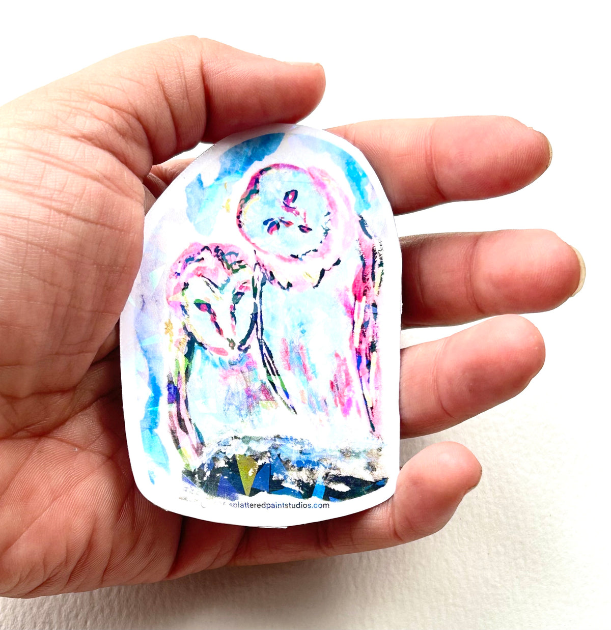 Celestial Keepers 3-inch vinyl sticker held in hand to show size and scale