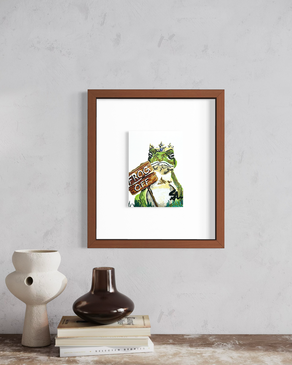 Frog Off 5x7 art print featuring a crowned frog displayed in a framed wall mockup
