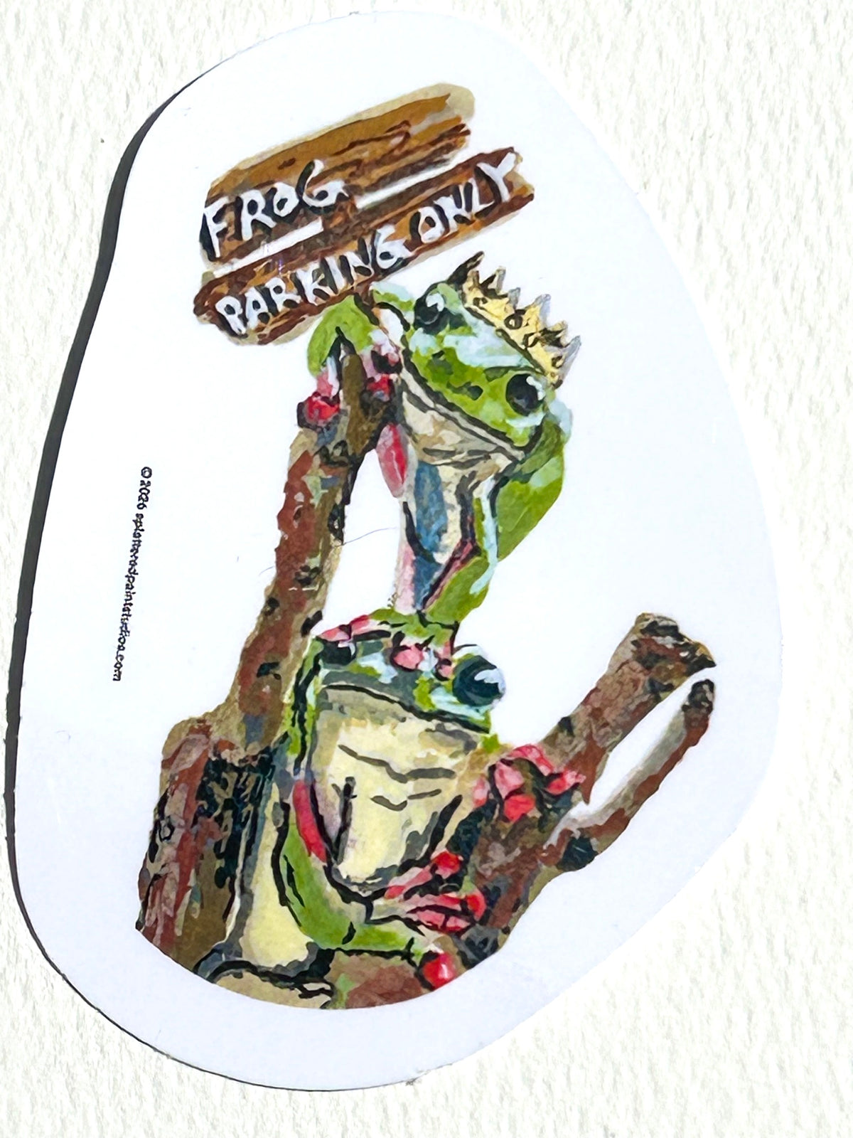 Frog Parking Only 3-inch vinyl sticker featuring two crowned frogs sitting on branches