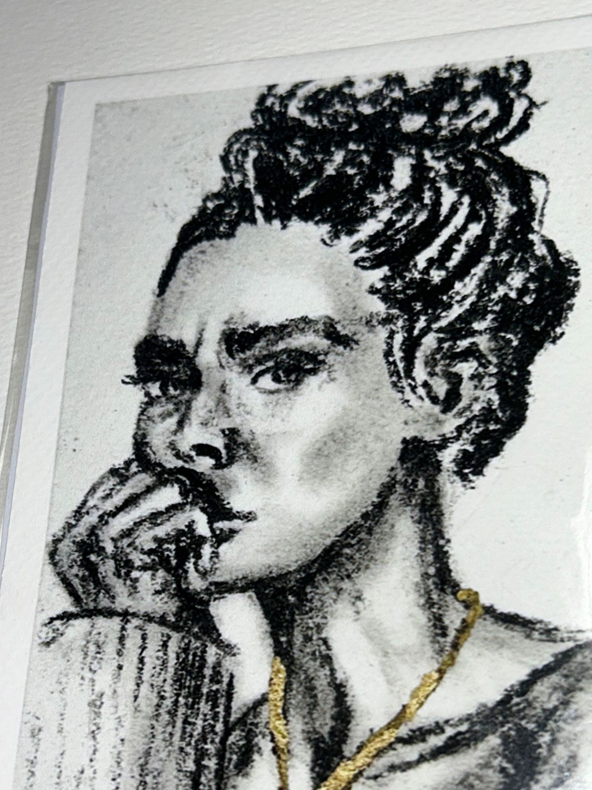 Close-up of Golden Defiance charcoal portrait print showing expressive black marks and metallic gold accents