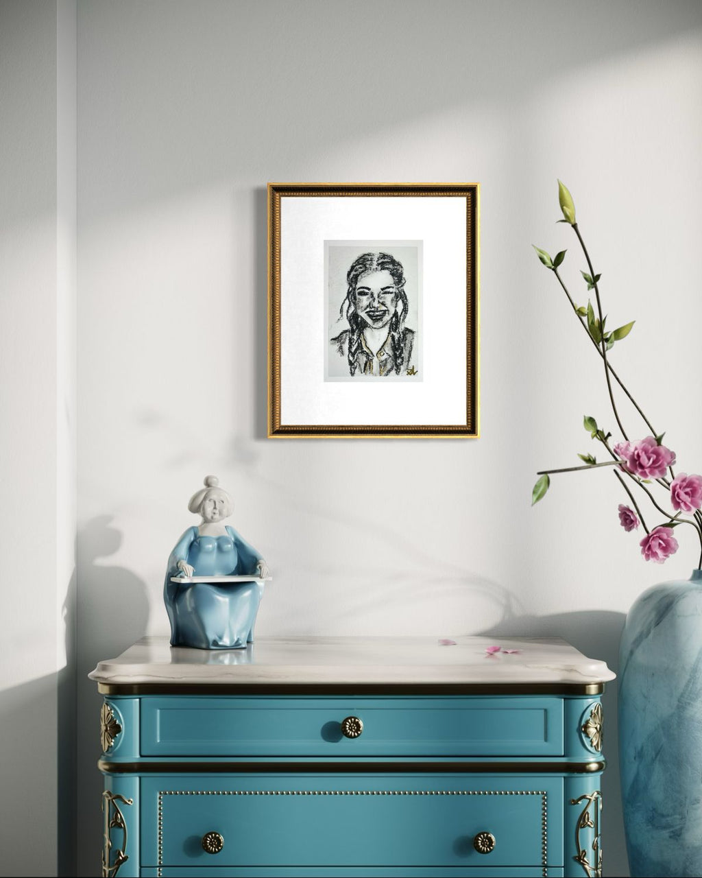 Golden Giggle 5x7 charcoal art print with gold accents displayed in a gold frame above a blue dresser