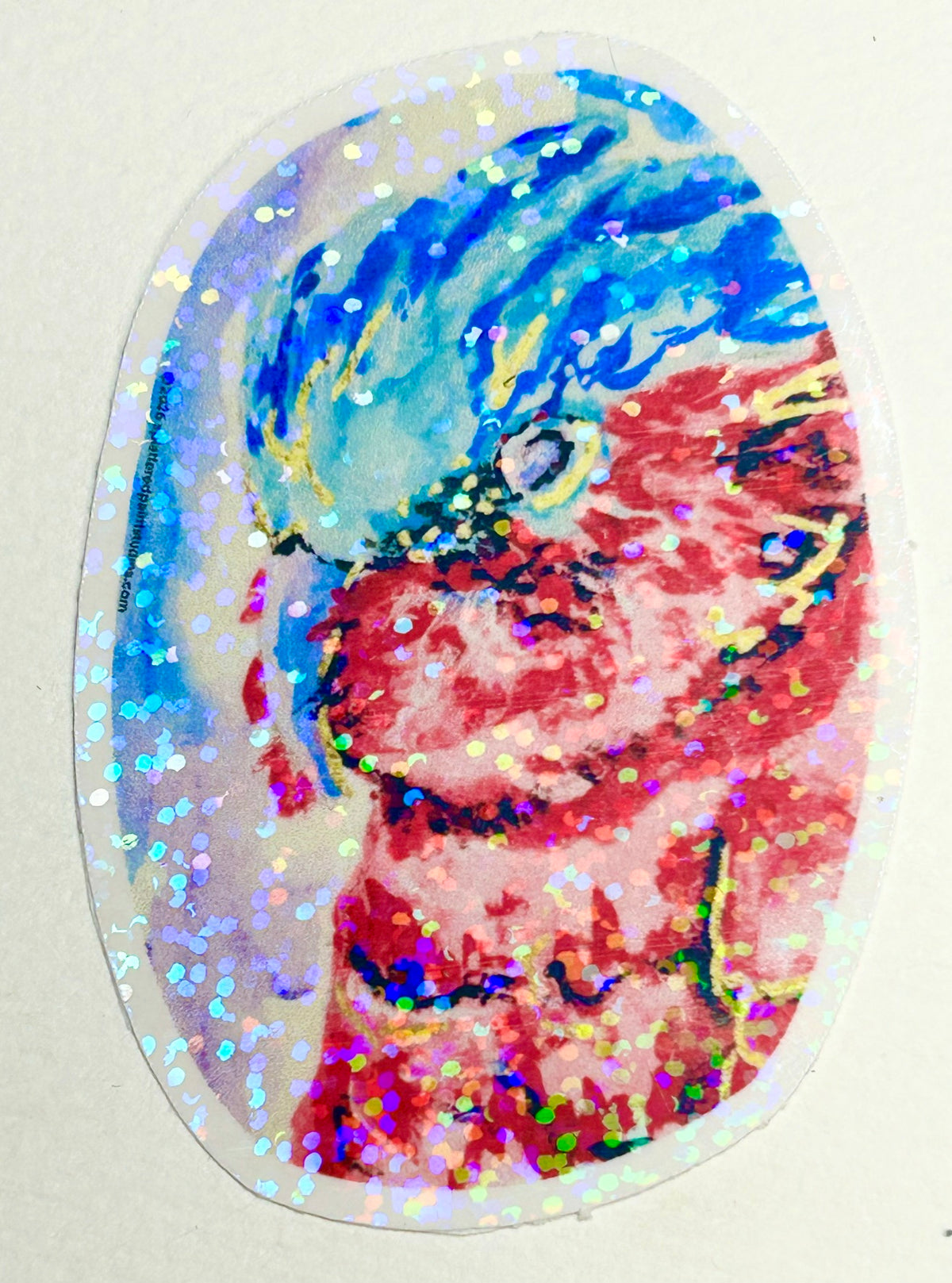 Nebula Regent 3-inch holographic vinyl art sticker featuring a vibrant pink and blue bird with reflective glitter details