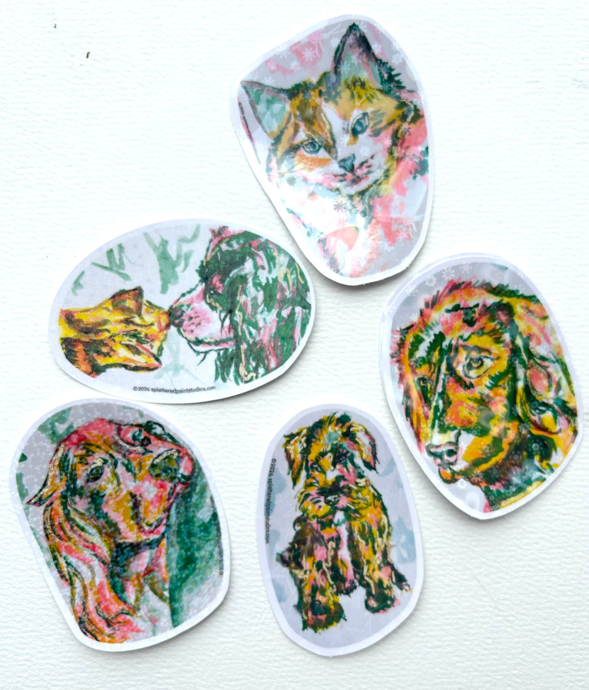 Group of colorful holographic cat and dog vinyl stickers from the Neon Familiars collection