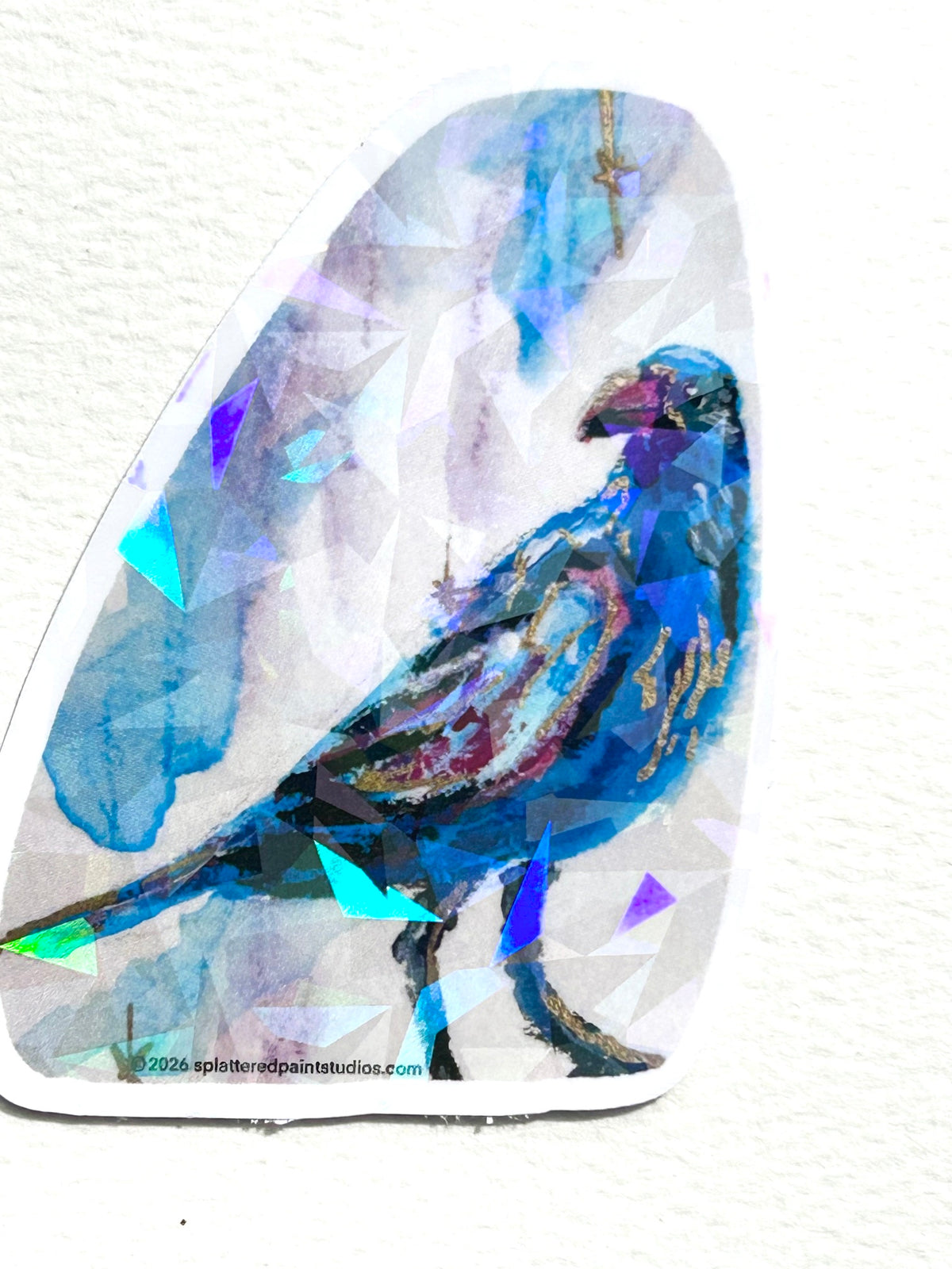 Nightflare 3-inch holographic vinyl sticker featuring a vibrant blue and purple bird with reflective geometric accents
