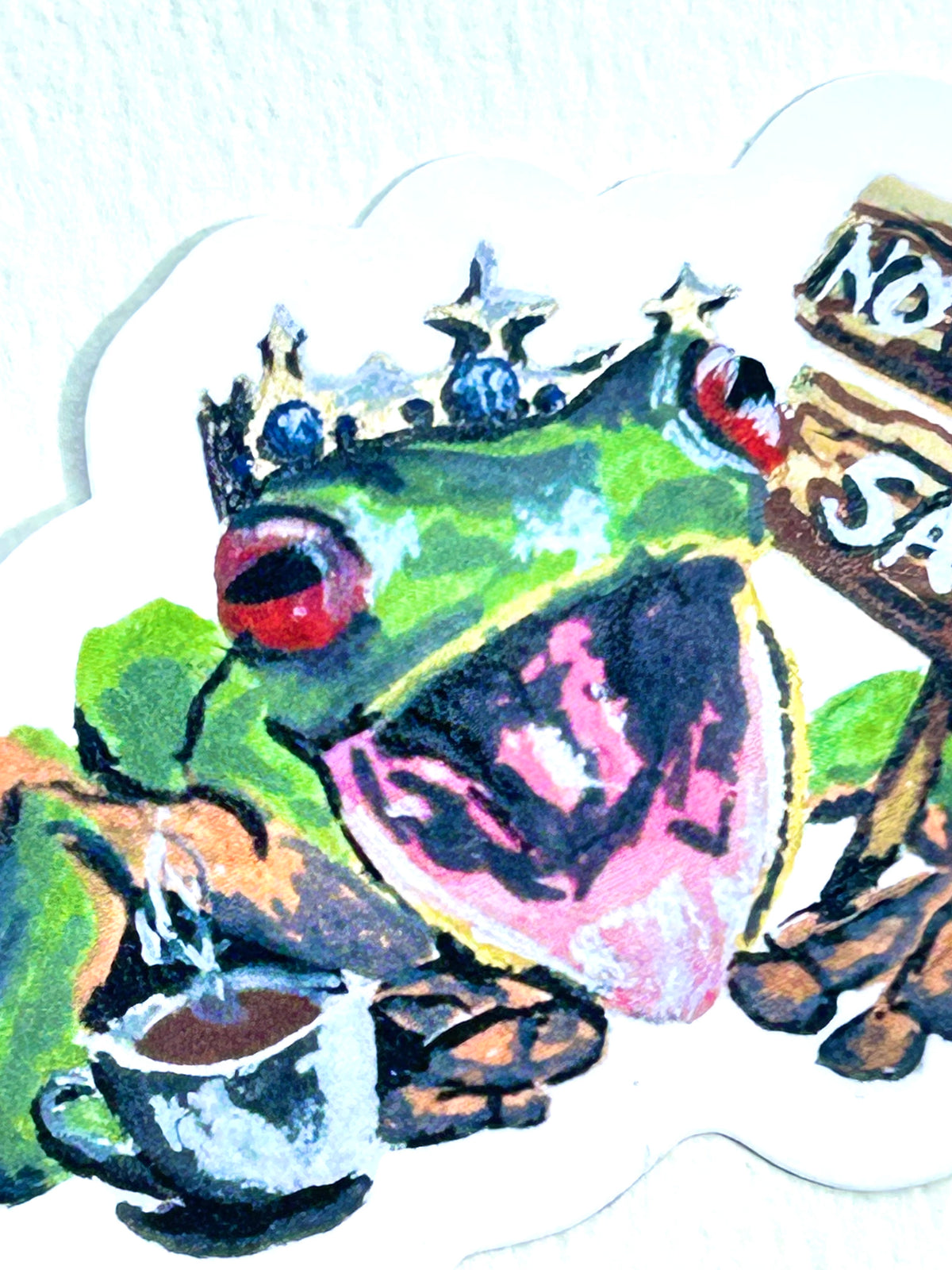Close-up of Not Today Satan vinyl sticker showing a crowned green frog with a coffee cup