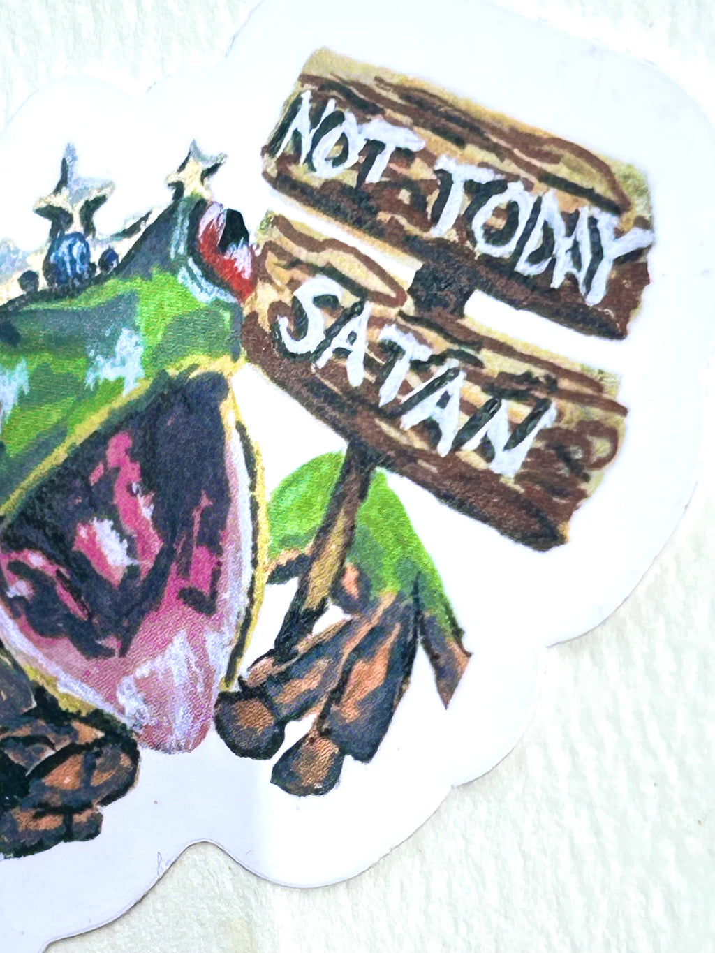 Close-up of Not Today Satan vinyl sticker showing the frog and hand-painted Not Today Satan sign