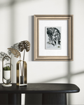 Quiet Ache 5x7 art print displayed in a gold frame in a modern interior setting