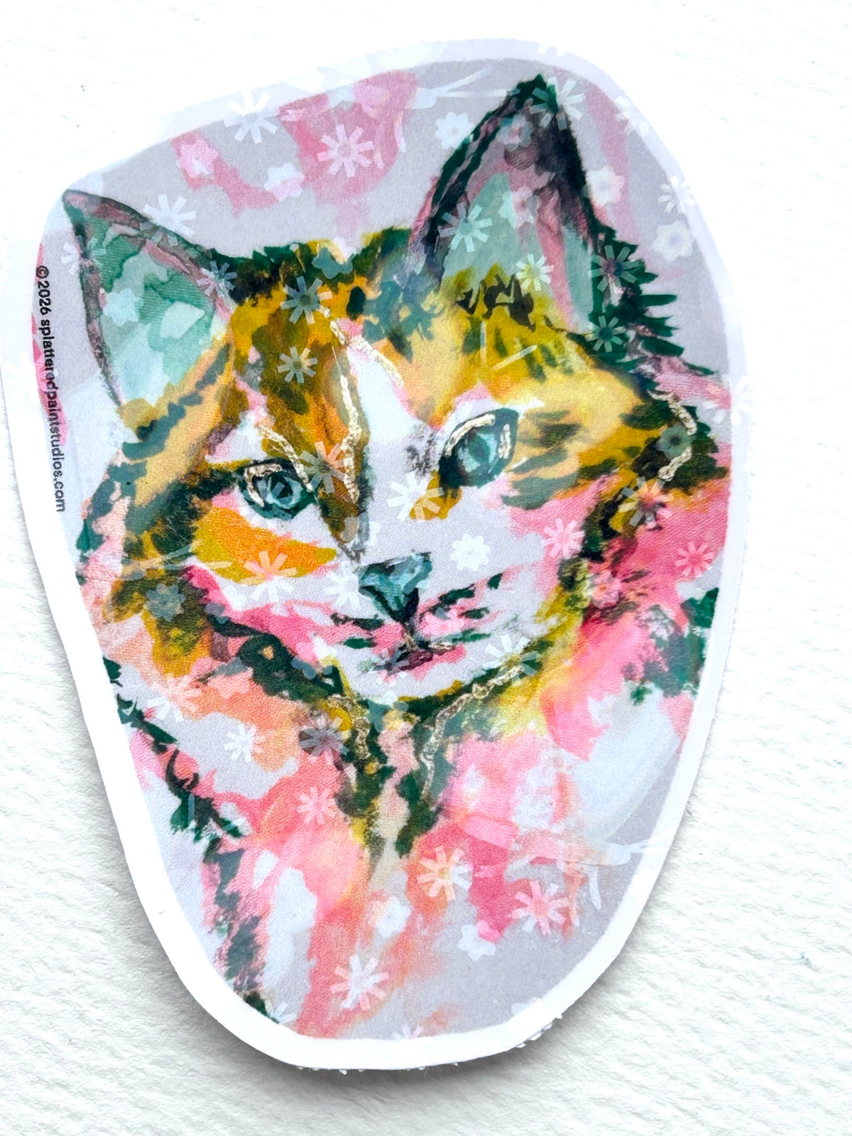 Radiant Stillness 3-inch holographic vinyl sticker featuring a colorful cat in pink, gold, and teal