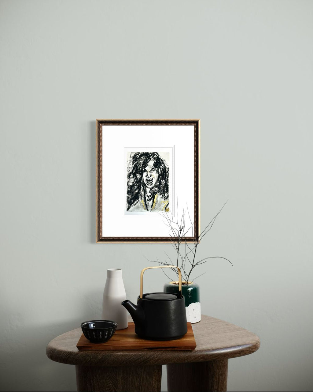 Rage Bloom 5x7 charcoal art print displayed in a framed wall mockup above a table