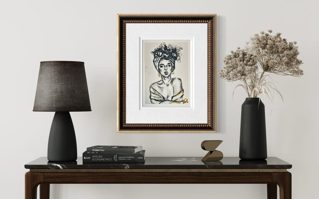 Regal Quiet 5x7 charcoal art print displayed in a decorative frame above a console table