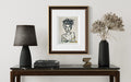 Regal Quiet 5x7 charcoal art print displayed in a decorative frame above a console table