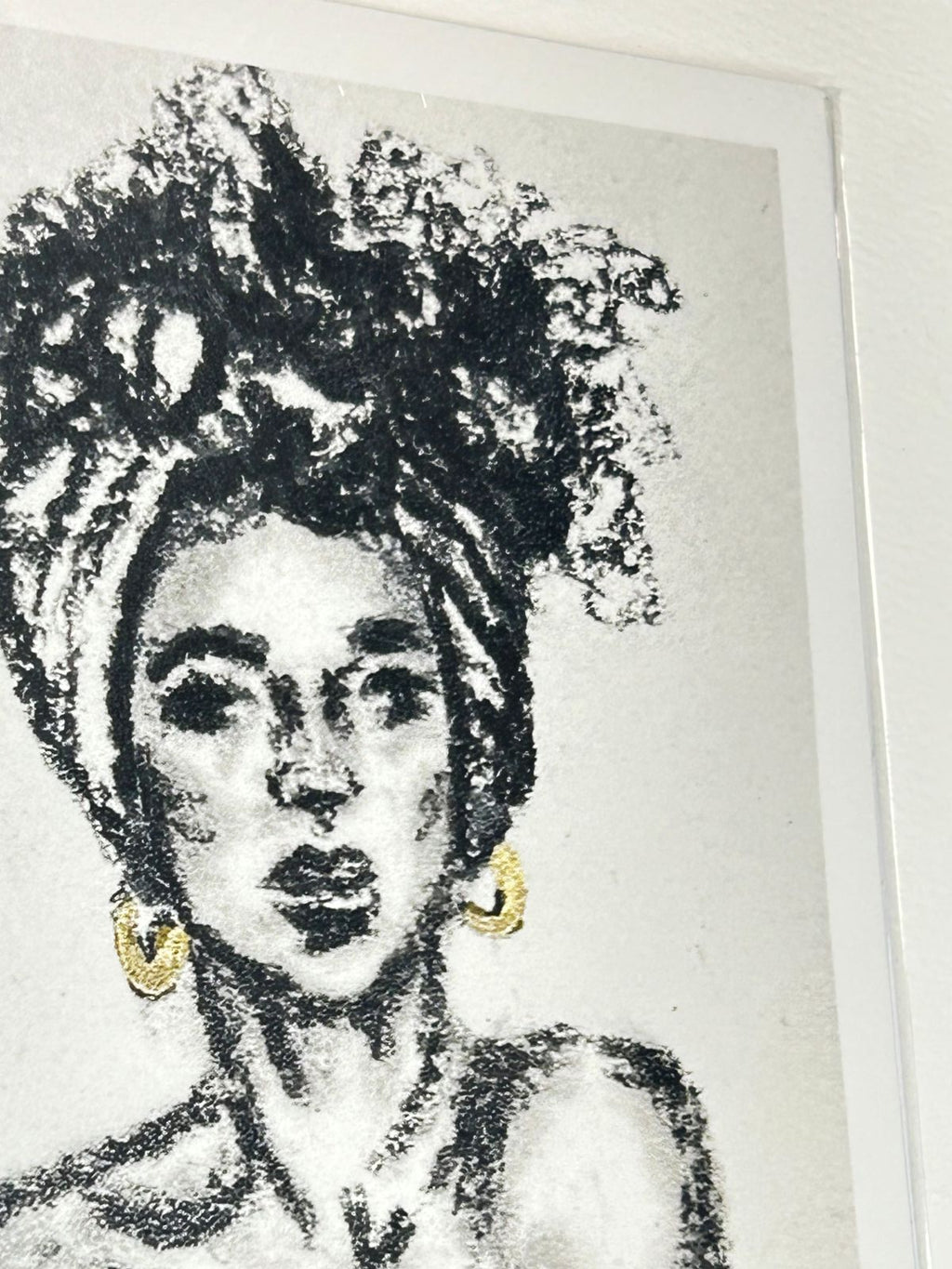 Close-up of Regal Quiet 5x7 charcoal art print showing an expressive portrait with gold accents
