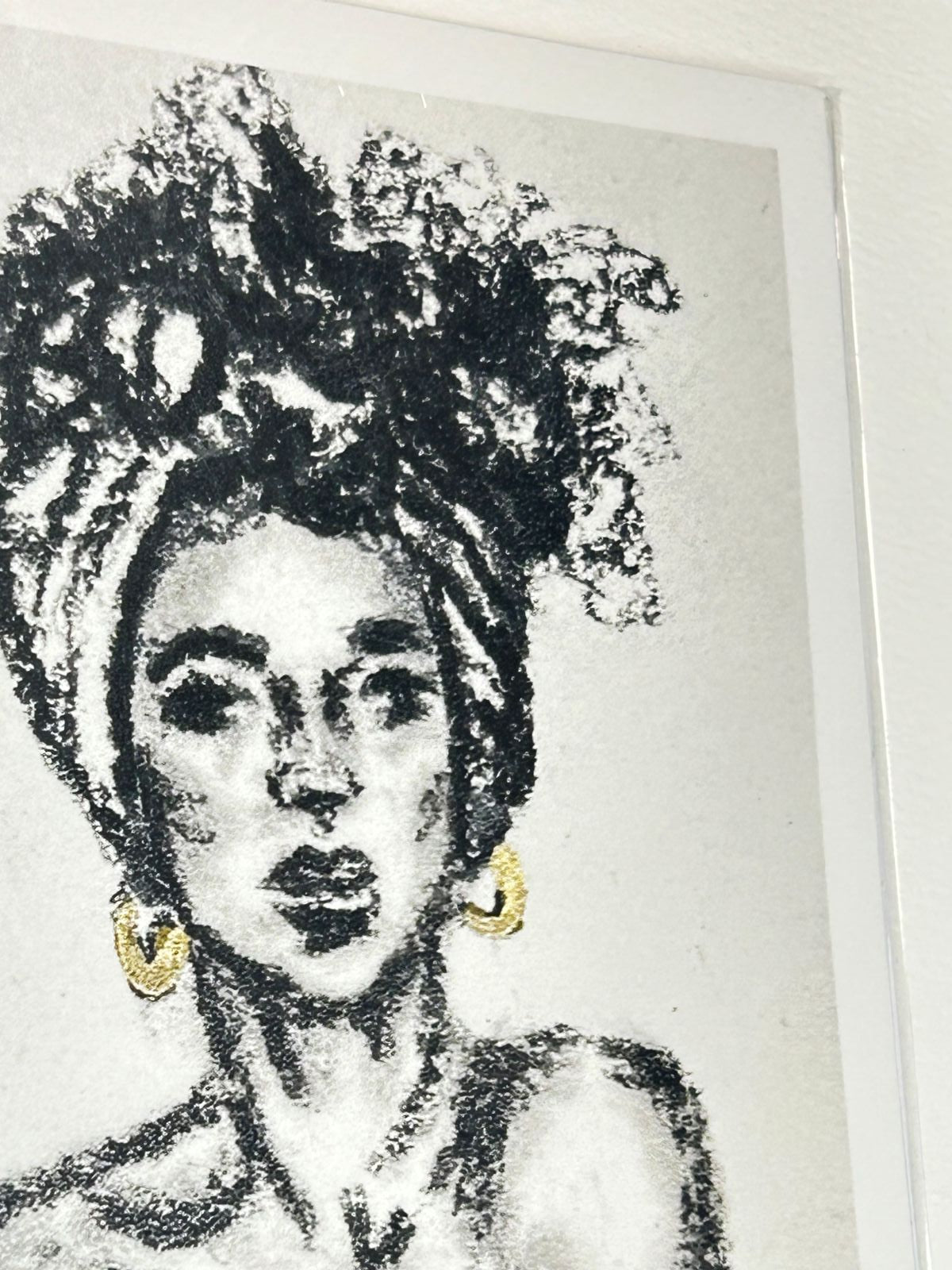 Close-up of Regal Quiet 5x7 charcoal art print showing an expressive portrait with gold accents