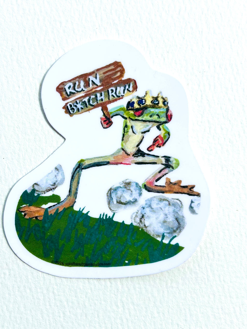 un B*tch Run 3-inch vinyl sticker featuring a crowned frog running with a wooden sign