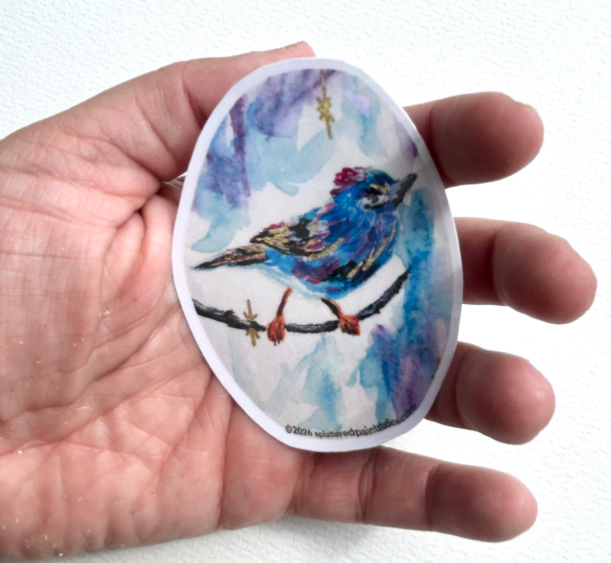 Starglint 3-inch vinyl art sticker held in hand to show size and scale