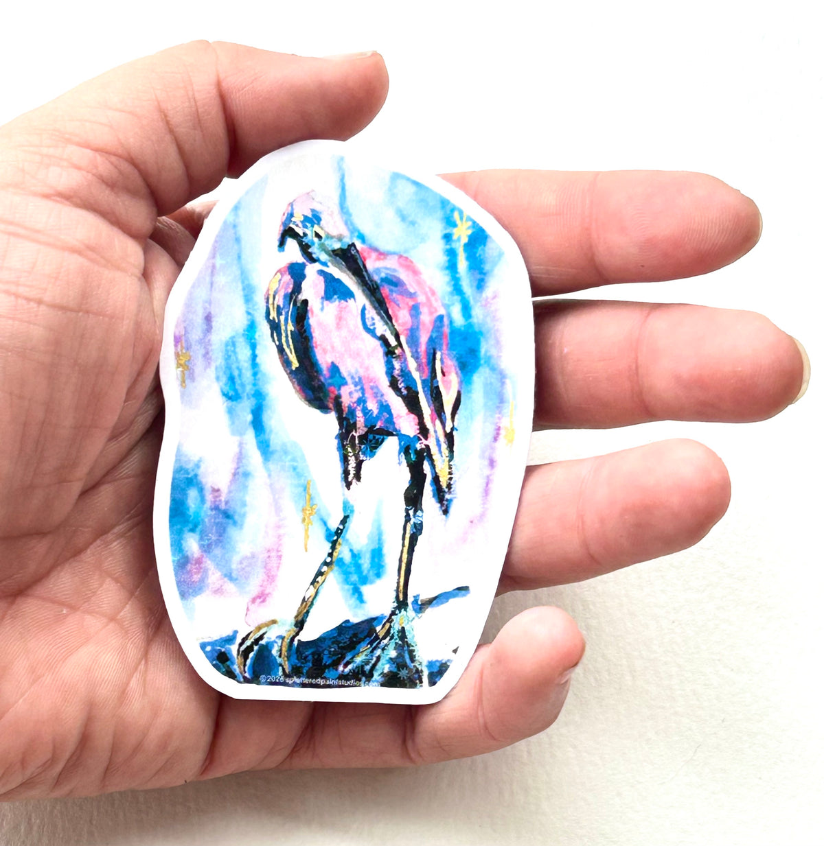 Starwake 3-inch vinyl art sticker held in hand to show size and scale