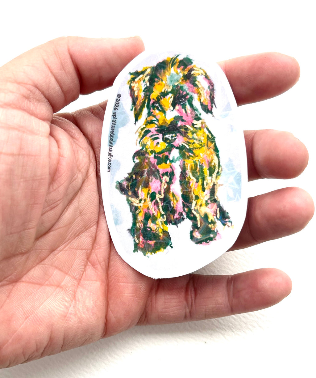 Static Whiskers 3-inch holographic vinyl dog sticker held in hand to show size and scale