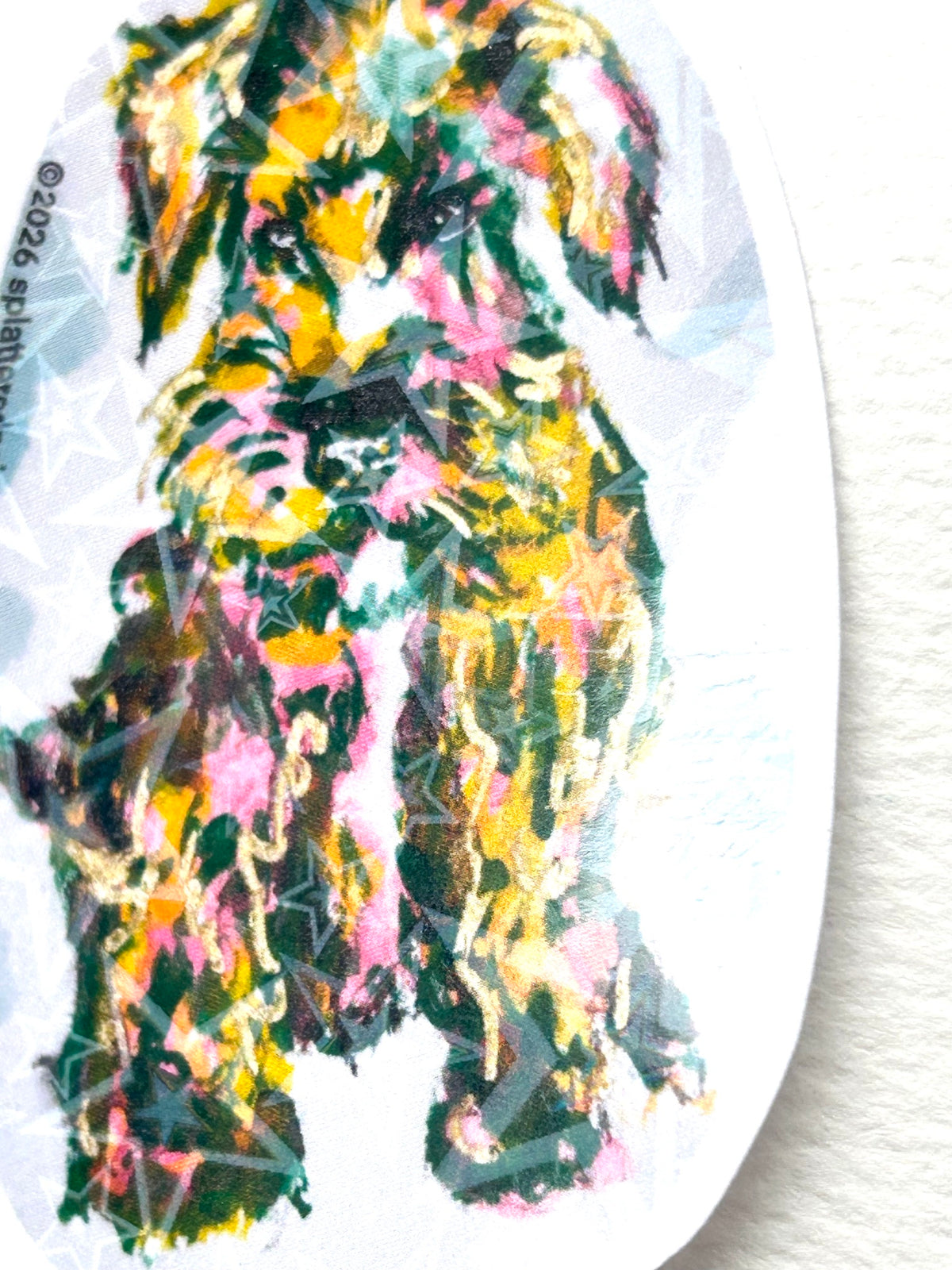 Close-up view of Static Whiskers holographic vinyl sticker featuring colorful dog artwork from the Neon Familiars collection