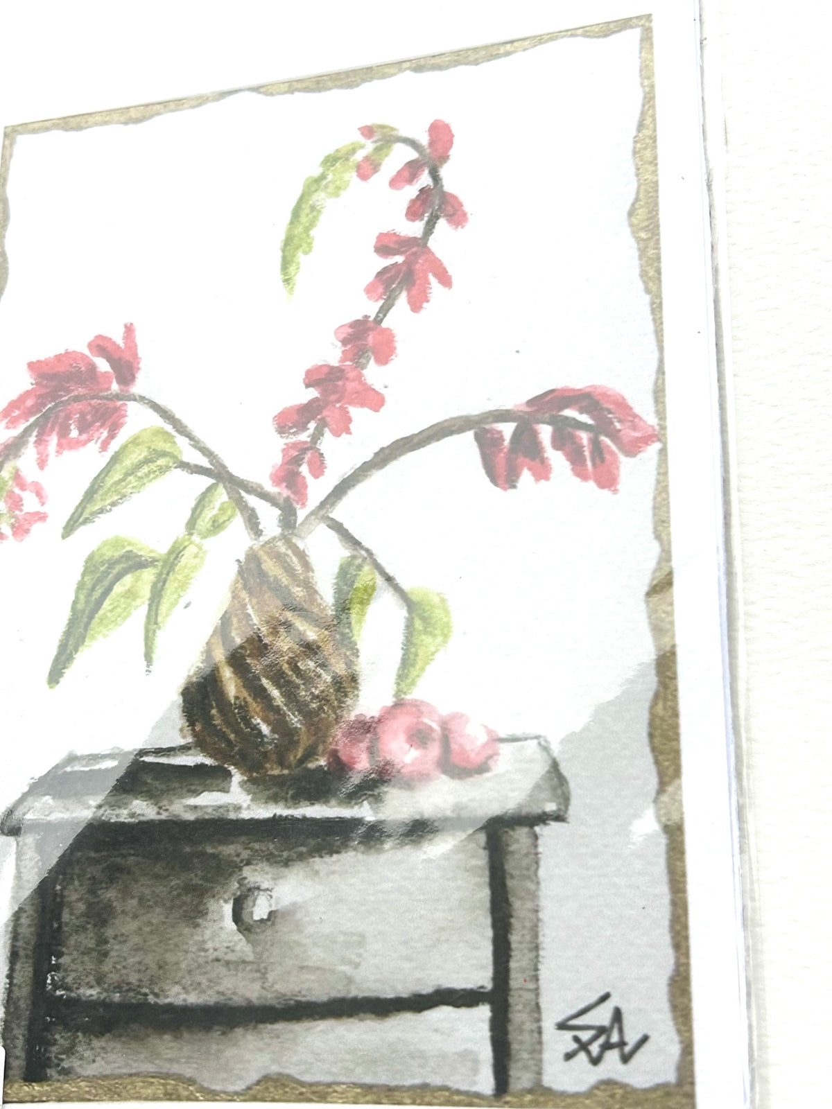 Angled view of Stillness on the Shelf 5x7 art print showing the floral still life, gold border, and artist signature