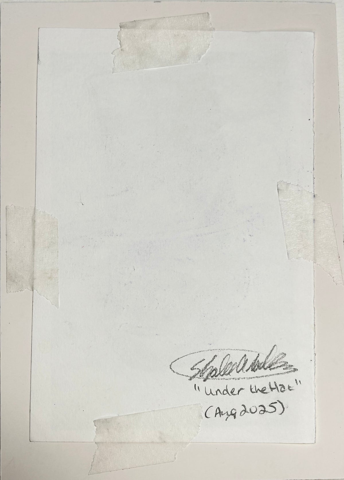 Back of Under the Hat original colored pencil drawing showing artist signature, title, and August 2025 date