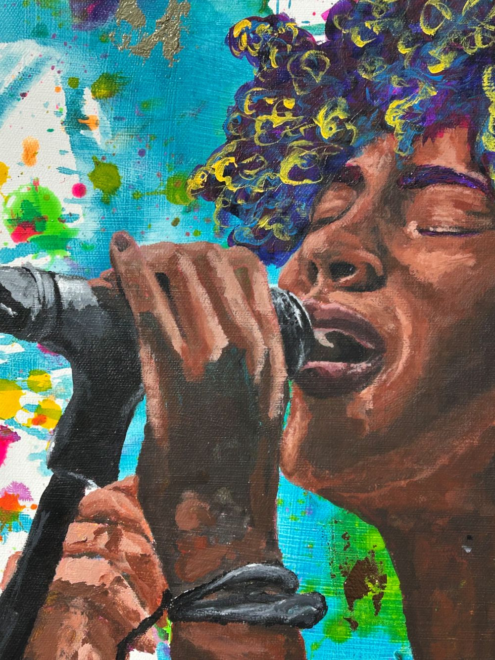 Close-up of Where the Music Lives original painting showing the singer, microphone, colorful brushwork, and canvas texture.